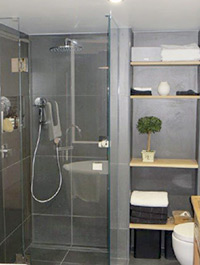 Bathroom fitout including hot water system